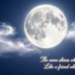 Bright full moon glowing in the night sky with soft clouds and a peaceful atmosphere.